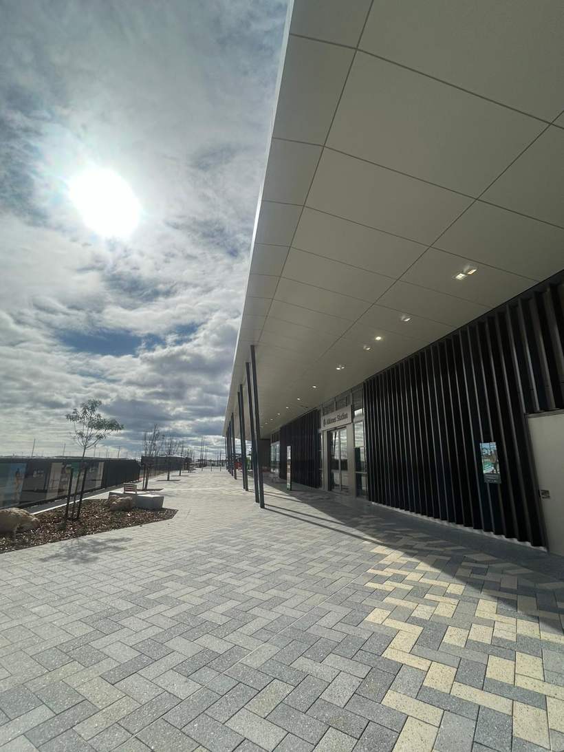 Cladded soffit running the length of the station concourse.