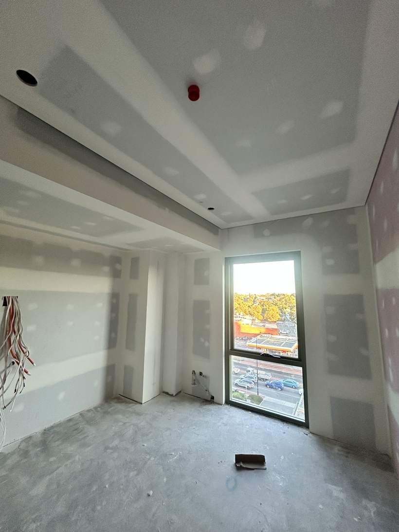 Bulkhead and set ceiling detail with flushed wall linings.
